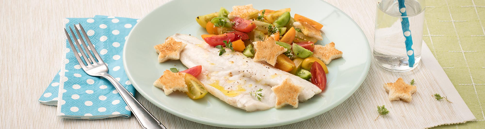 Branzino con tris di pomodori e stelline di pane - Ricette Findus