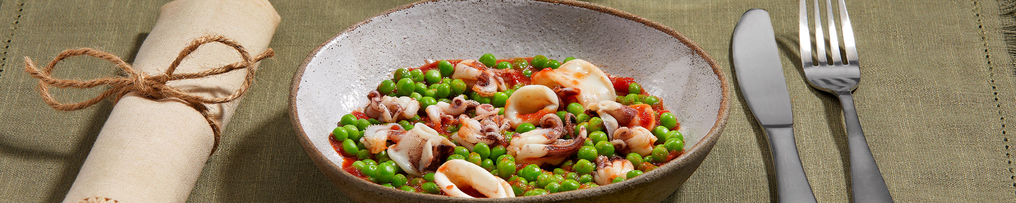 Calamari e piselli in umido