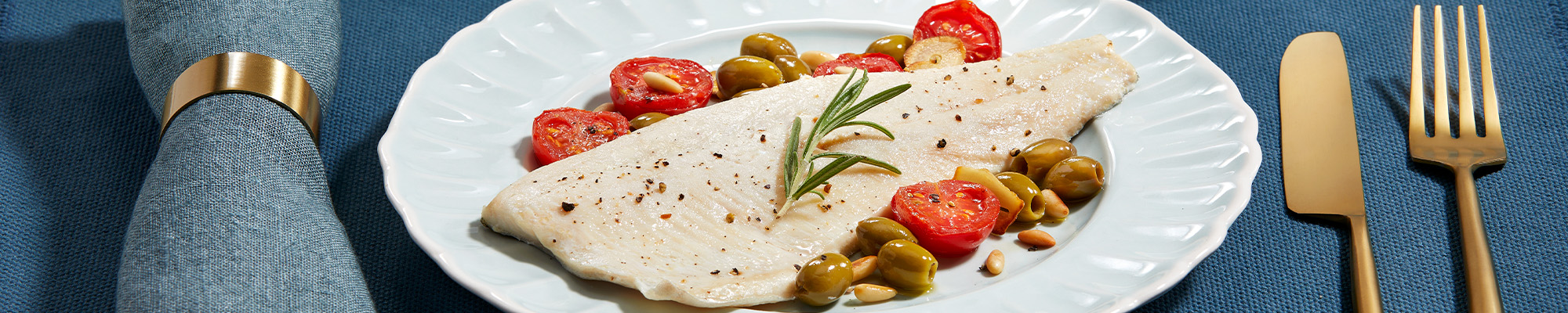 Orata alla ligure con pinoli e olive taggiasche